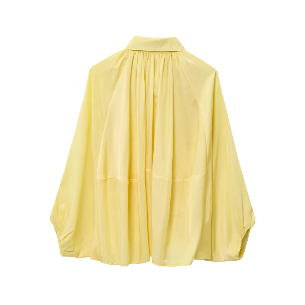 women's jacket is fashionable and simple with a lapel and zipper style puffy sleeves that exude a summer vibe